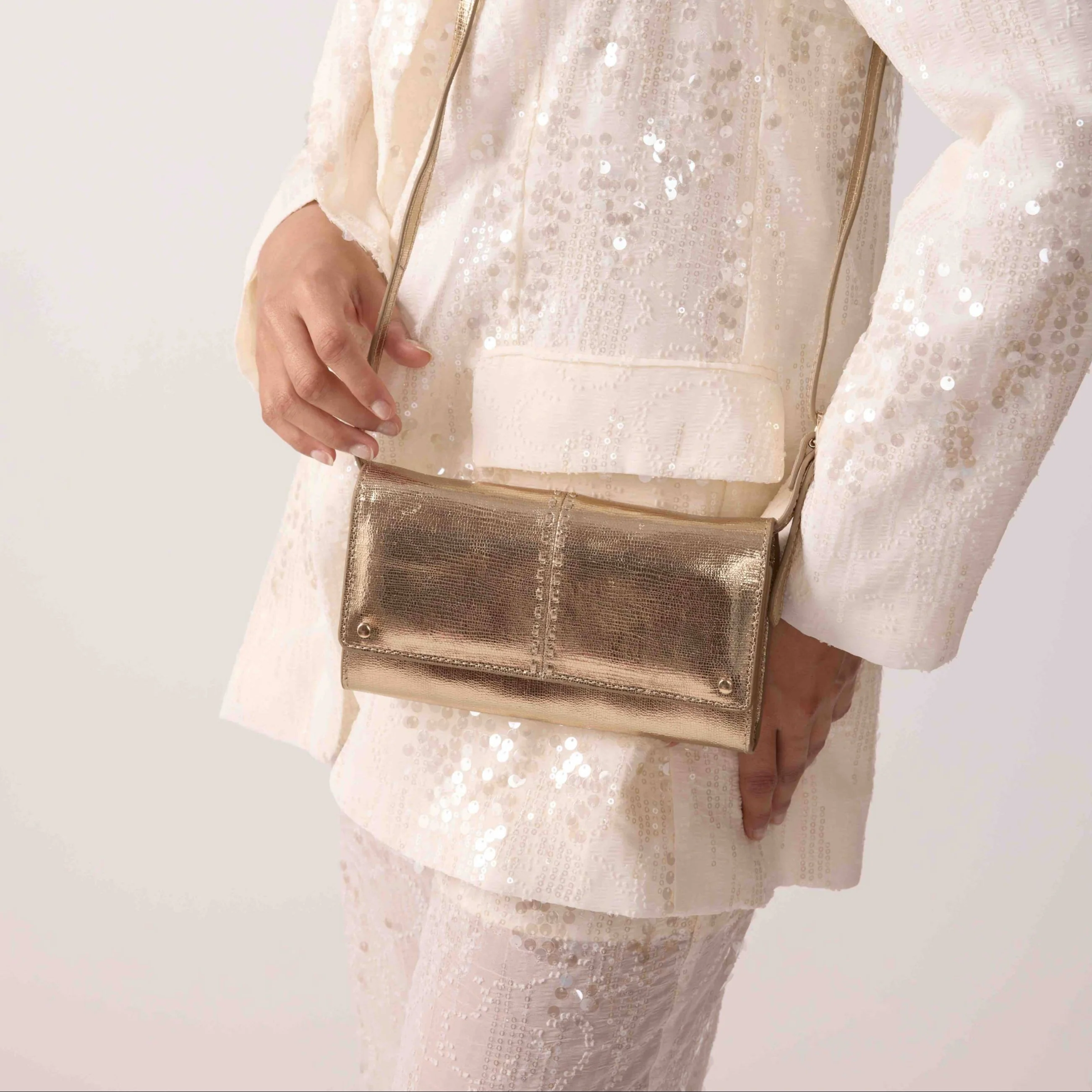 Gina gold clutch and crossbody bag